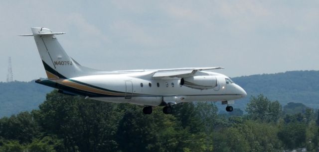 Fairchild Dornier 328JET (N407FJ) - On final is this 2000 Fairchild Dornier 328-300 Jet in the Summer of 2021.