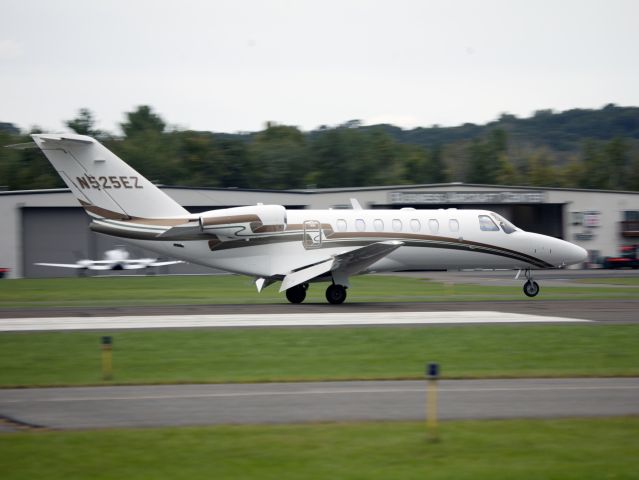 Cessna Citation CJ3 (N525EZ) - Landing rollout runway 08 at Danbury CT.