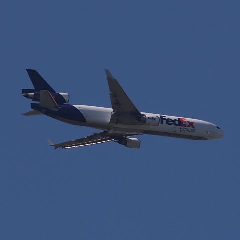 Boeing MD-11 (N588FE) - On final to runway 27.