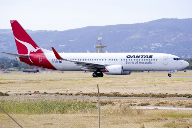Boeing 737-800 (VH-VYC) - On taxi-way heading for take-off on runway 05. Friday, 19th April 2013.