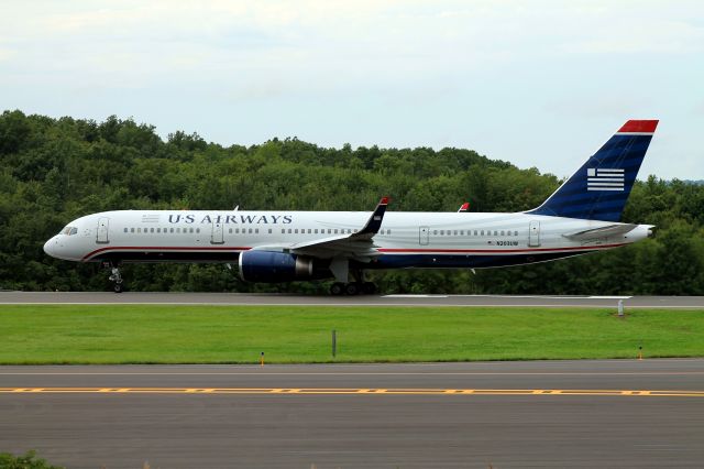 Boeing 757-200 (N203UW) - Beginning its roll down runway 24. Taken on September 2, 2013.