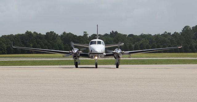 Beechcraft King Air 90 (N308CM) - JPS Aviations Beechcraft King Air C90GTx entering the Gulf Air Center ramp at Jack Edwards National Airport, Gulf Shores, AL - June 29, 2017.