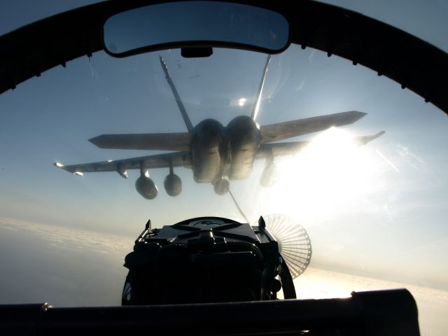 — — - Refueling an F/A-18F Super Hornet