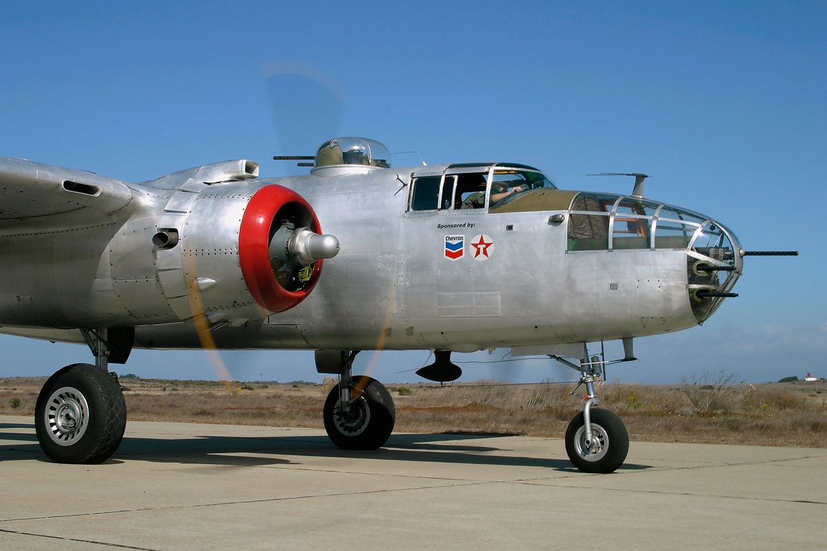 N9117Z — - The North American B-25J Mitchell bomber In the Mood warming up her engines @ Marina, CA.