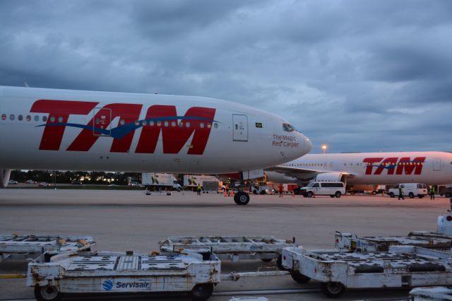 BOEING 777-300 (PT-MUJ) - B767-300ER in the background