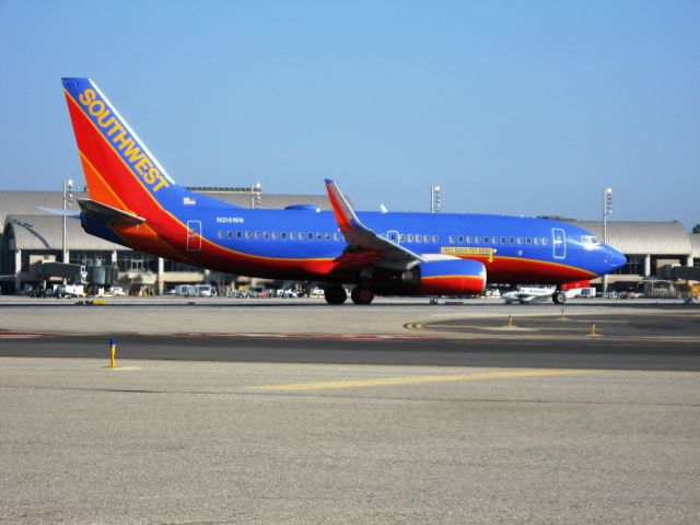 Boeing 737-700 (N215WN) - Line up and wait on RWY 20R