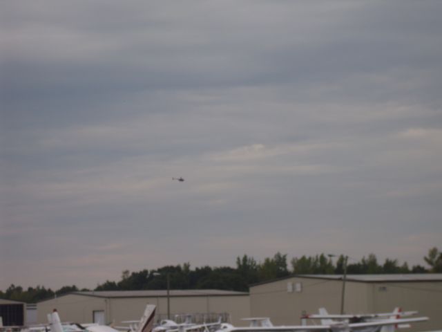 Robinson R-44 (N207CB) - Departing CCO