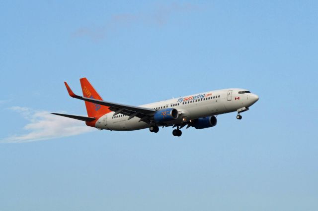 Boeing 737-800 (C-FTJH) - Arriving from Punta Cana on runway 24R