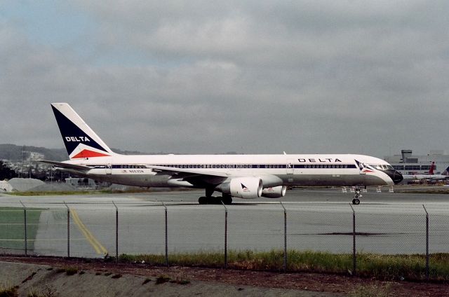 Boeing 757-200 (N663DN) - KSFO - Delta 757 into position and hold at San Francsico Runway 1R - this taken from the old Millbrae Airpark pre 9/11.