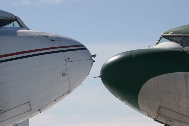 — — - DC-3s Nose-to-Nose at Basler Aviation Oshkosh, WI