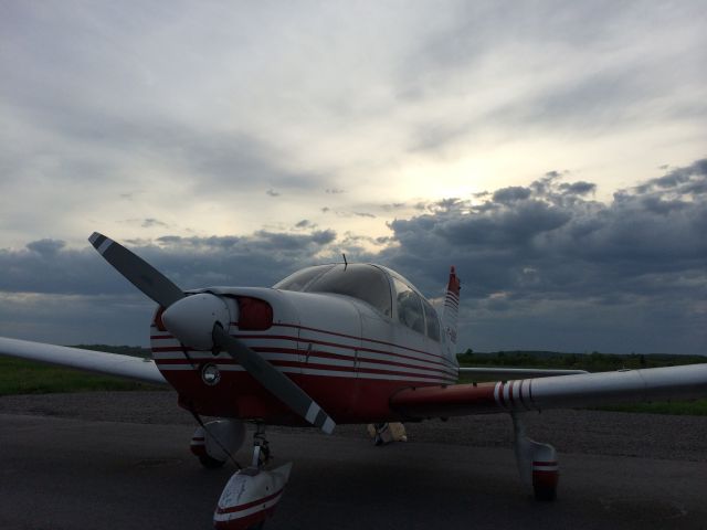 Piper Cherokee (C-GOBQ) - C-GOBQ posing in front of a coldfront emerging from behind...