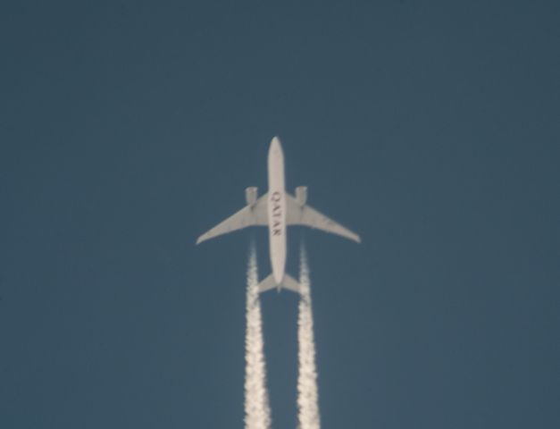Boeing 777-200 (QTR739) - This is one of 3 flights from the Persian Gulf as seen mid day in Carson City. This flight comes by daily and typically has a flight path a bit more to the east. Today it flew directly overhead.