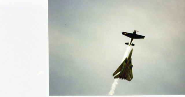 — — - A Grumman pair doing a very tight display at Oshkosh 96