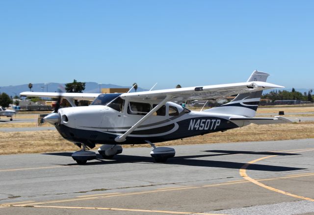 Cessna 206 Stationair (N450TP) - Local 206 taxing to its hangar at Reid Hillview.