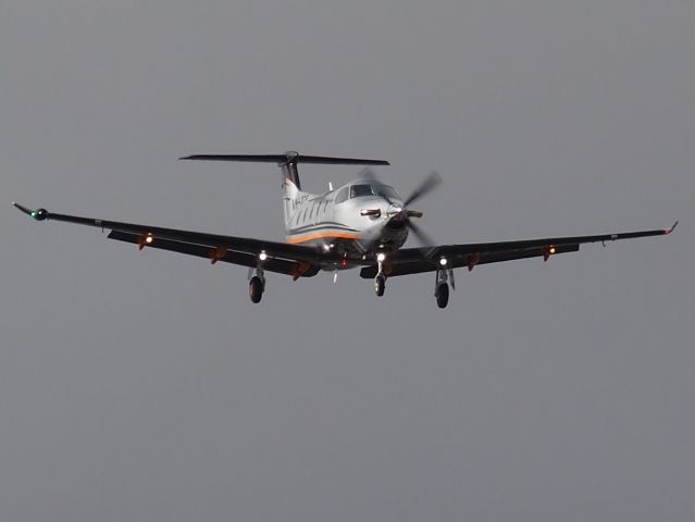 Pilatus PC-12 (VH-TCP) - Coming in to land on runway 23, Adelaide International Airport. Photo taken from Brooklyn Park, SA.