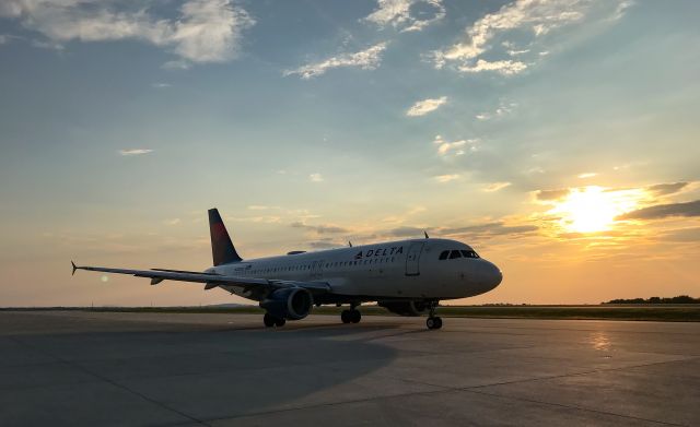 Airbus A320 (N320US) - An A320 registered as 320!  Beautiful sunset on a mild evening in SC!