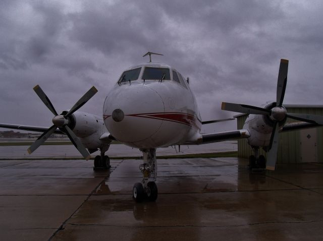 Grumman Gulfstream 1 (N65CE) - The G-1 weathering the storm in Des Moines Iowa