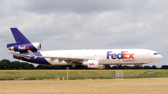 Boeing MD-11 (N609FE) - "Scott" taxiing to the hub after arrival on 18R.