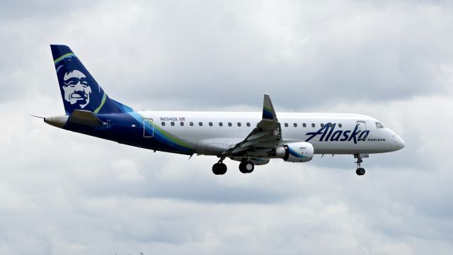 Embraer 175 (N634QX) - QXE2863 from LAX on final to Rwy 16R on 7.11.19. (ERJ-175LR / cn #17000726).