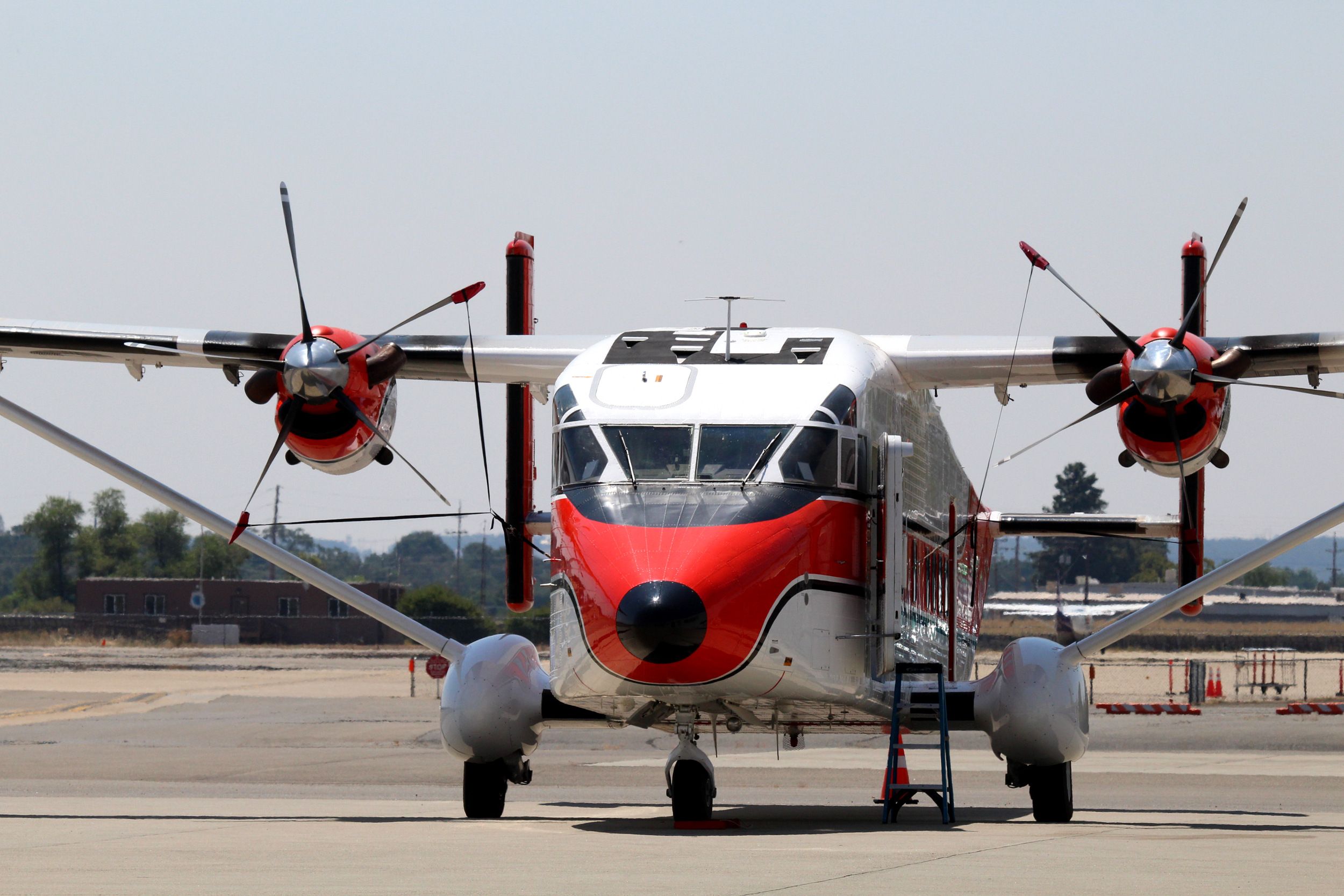 Short 330 (N175Z) - KRDD - USFS Sherpa undergoing some minor maintenance on the ramp near the fire station. There was no way to get a side shot as next to the building 7-28-2016. 111 degrees today at lunch! click full.