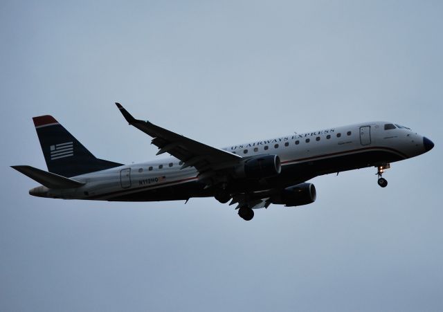 Embraer 170/175 (N112HQ) - Final for 36R - 9/18/11