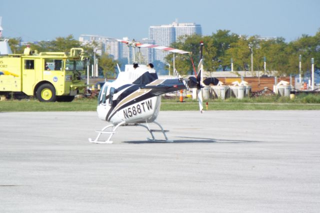 Bell JetRanger (N588TW) - N588TW sitting on the ramp in front of the terminal during the 2018 Cleveland National Air Show.