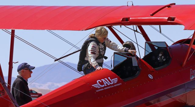 Boeing PT-17 Kaydet (N63529) - Victoria Shannon "Vicky" Benzingbr /"Vicky Benzing Aerosports"br /.... climbing into her Boeing Stearman PT-17 Kaydet (N63529) ....br /to give another of her dazzling air show performances.br /br /One of the most accomplished female pilots of the present day, this lady is absolutely amazing.br /Anyone who has never seen her perform has missed seeing a Lady Legend of the Skies.br /I've seen her superb flying performances several times.  My one and only regret is that I've never had the opportunity to meet her in person just long enough to tell her to her face how very much I admire everything she has accomplished.  To me, she is the Lady Legend of the Skies.