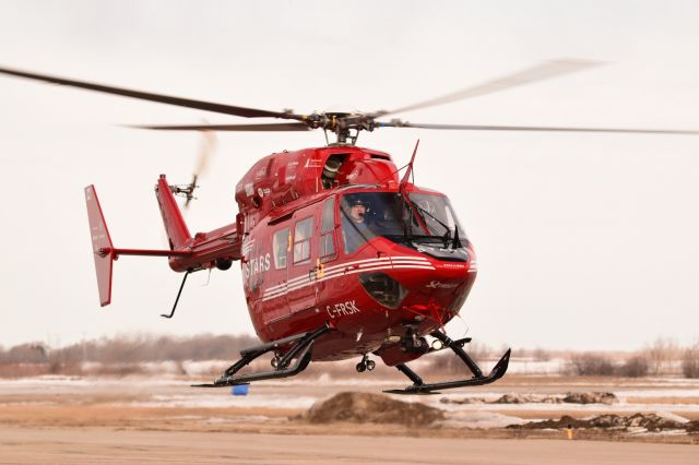 NUSANTARA NBK-117 (C-FRSK) - STARS helicoptor making a short appearance at Yorkton. Dirty brown melting snow in the background will hopefully soon turn to a nice green. Aahhh, spring!!