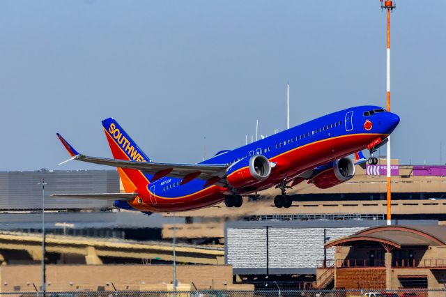 Boeing 737 MAX 8 (N872CB) - A Southwest Airlines 737 MAX 8 in Canyon Blue retro livery taking off from PHX on 3/4/23. Taken with a Canon R7 and Canon EF 100-400 L II lens.