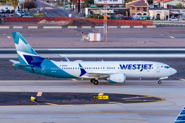 Boeing 737 MAX 8 (C-GIWJ) - A WestJet 737 MAX 8 taxiing at PHX on 2/1/23. Taken with a Canon R7 and Tamron 70-200 G2 lens.