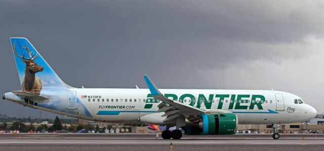 Airbus A320neo (N370FR) - N370FR, with Elrey the Elk on the tail, has dirty wings, thrust reversers deployed, and brakes in action to slow down on 34R after arriving from Denver.