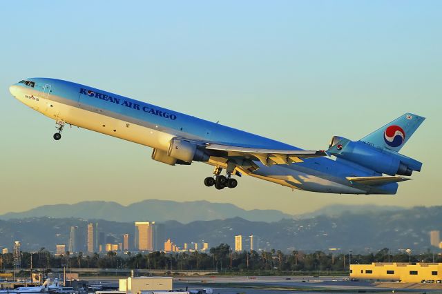 HL7371 — - A Korean Air Cargo McDonnell Douglas MD-11 taking off @ LAX at near sunset.