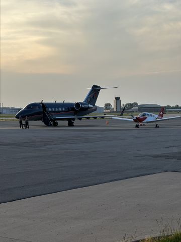 Canadair Challenger (N400DH) - After cheating to win the race at Kansas Speedway. Denny Hamlins plane waits in him. 