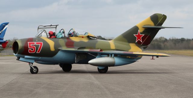 PZL-MIELEC SBLiM-2 (NX157GL) - A Mikoyan-Gurevich MIG-15UTI (PZL-Mielec SBLiM-2) taxiing onto the ramp at H. L. Sonny Callahan Airport, Fairhope, AL, during the 2019 Classic Jet Aircraft Association Fly-In and Conference - March 2, 2019.