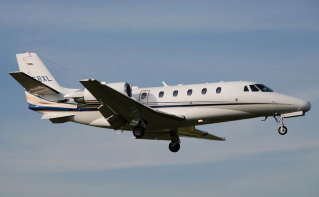 Cessna Citation Excel/XLS (ASP298) - Landing Buttonville runway 15 - ASP298 is Citation 560XL C-FBXL.