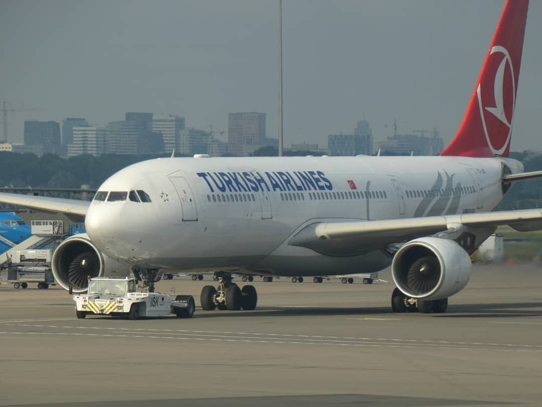 Airbus A330-300 (TC-JOS) - Turkish Airlines A330 pushing back in front of the Dutch Skyline