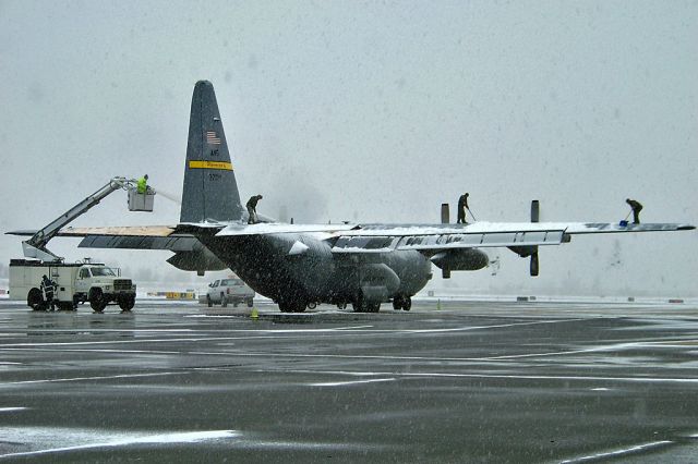 Lockheed C-130 Hercules — - Best time of the year, Winter! Interesting way of getting that snow off