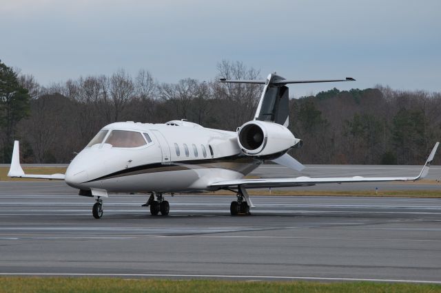 Learjet 60 (N11TS) - NTS DEVELOPMENT COMPANY at KJQF for the Belk Bowl (UGA vs. Louisville) - 12/30/14