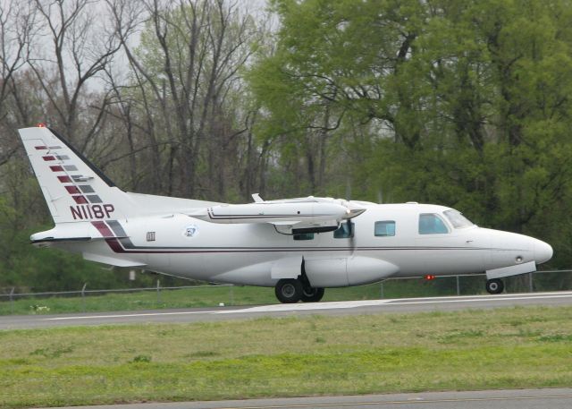 Mitsubishi MU-2 (N118P) - Starting to roll down runway 14 for take off from the Shreveport Downtown airport.