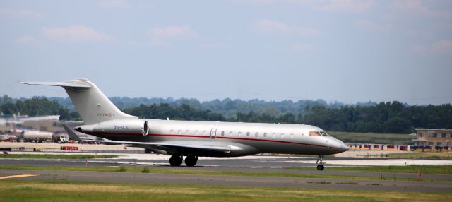 Bombardier Global Express (9H-VJL) - Taxiing to the gate is this 2014 "Vistajet" Bombardier Global Express 6000 in the Summer of 2022.