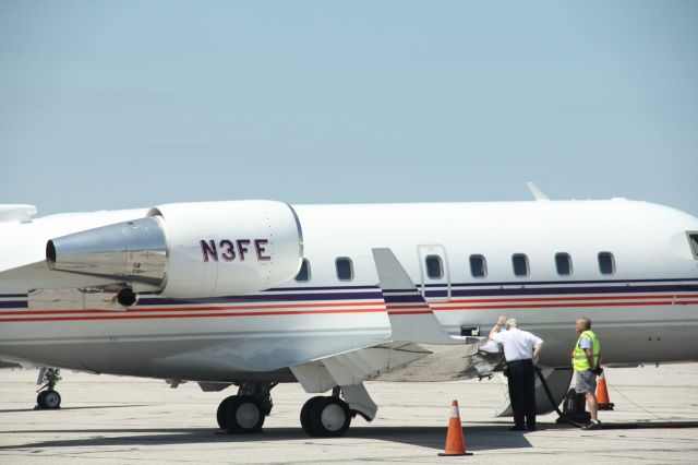 Canadair Challenger (N3FE) - Fedex Exec Jet at BWI..Captain oversees fueling