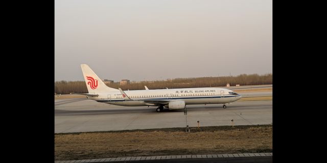 Boeing 737-800 (B-5485) - Beijing int'l with a sunrise