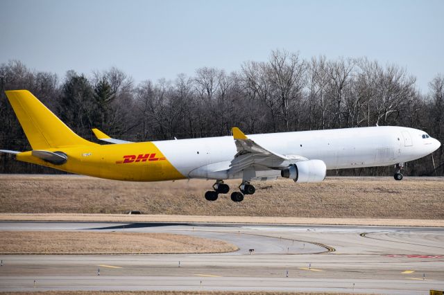 Airbus A330-300 (EI-HEA) - Airbus A330-322F operated by ASL Airlines Ireland on behalf of DHL, arriving on 18L at KCVG from Reykjavik (KEF)
