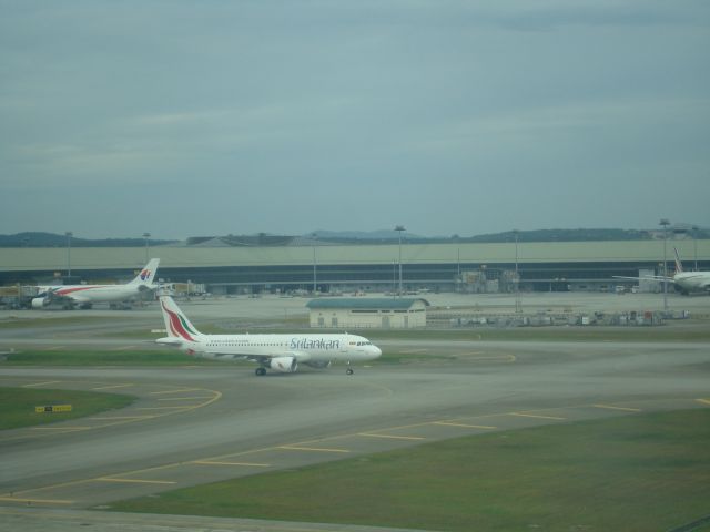 Airbus A320 (4R-ABP) - TAKEN FROM THE KLIA VIEWING GALLERY.