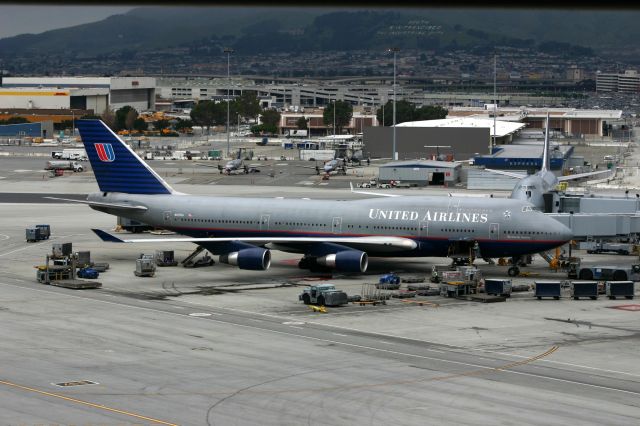 Boeing 747-400 (N127UA) - KSFO - UAL 747 at gate 97 I think.2/13/2005 photo