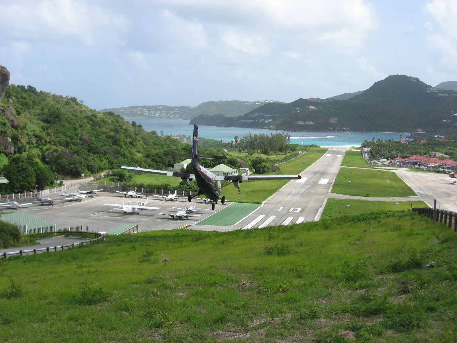 — — - Shows the steep approach required at St Barts