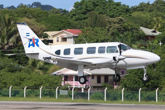 Piper Navajo (HR-AYK) - Landing at Juan Manuel Galvez International Airport MHRO