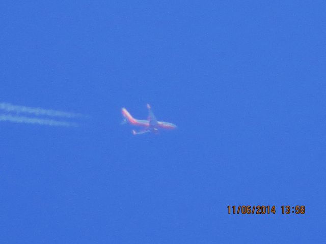 Boeing 737-700 (N927WN) - Southwest Airlines flight 454 from SAN to IAD over Southeastern Kansas at 37,000 feet.