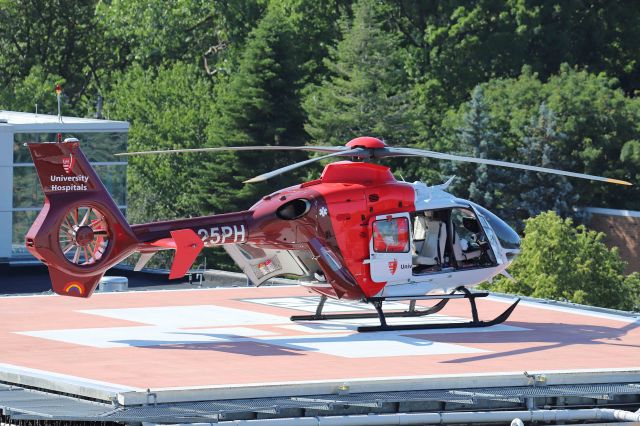 Eurocopter EC-635 (N325PH) - A new paint scheme and addition to the University Hospitals MedEvac fleet. I saw this guy coming in low towards the Cleveland Clinic Fairview Hospital in our Westpark neighborhood in Cleveland, OH, so I hopped over and caught a few shots from the parking garage on 5 Jul 2020. I would have preferred nose or side shots but the new colors and angle still made for good shots. N325PH, a PHI Medical Eurocopter EC-135P-2+, now Airbus Helicopters, was delivered UH a couple of weeks ago.