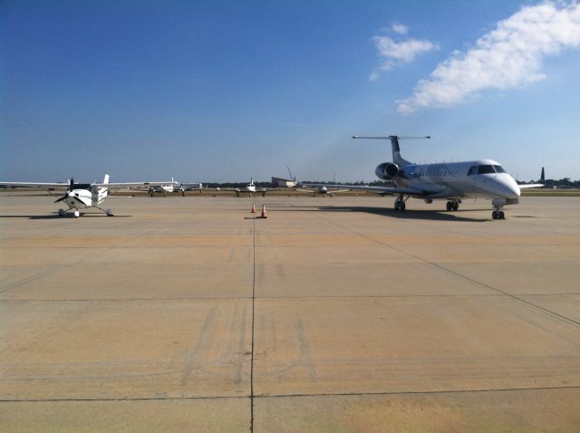 Cessna Skylane (N564PS) - On the ground at KGPT sitting next to this Legacy 6000